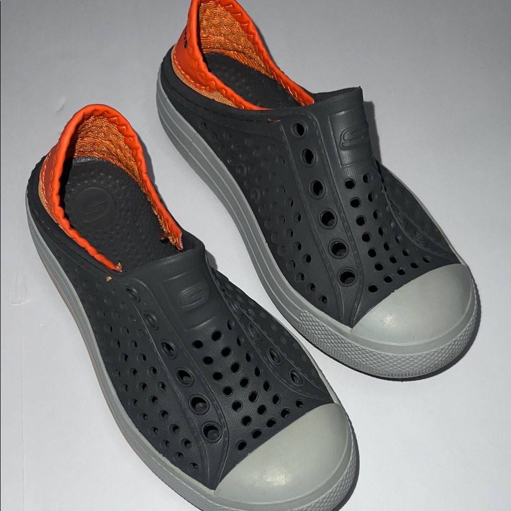 Skechers Kids Black and Orange Slip-On Sneakers - Picture 1 of 10